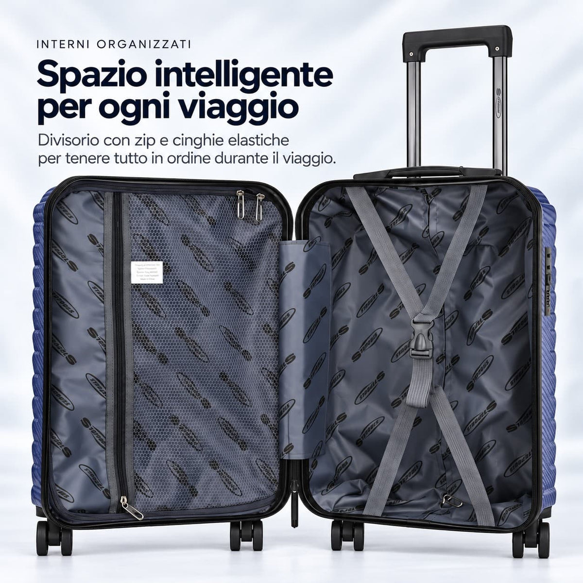 Interno del trolley cabina Voyager Stopover aperto, con divisorio in rete con zip e cinghie elastiche fermabiancheria a X