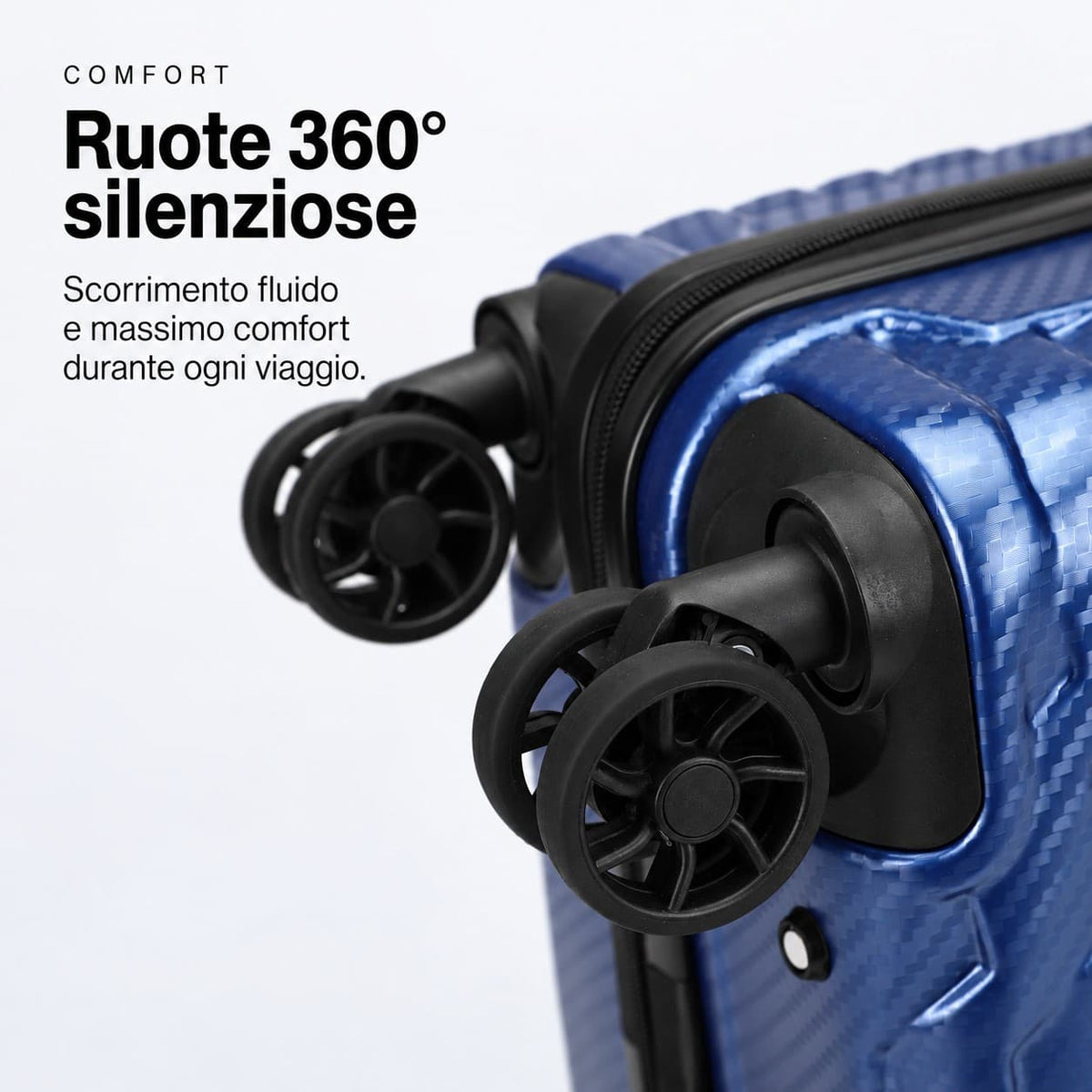 Primo piano delle ruote doppie silenziose a 360° del trolley cabina Voyager Stopover blu in ABS e PC
