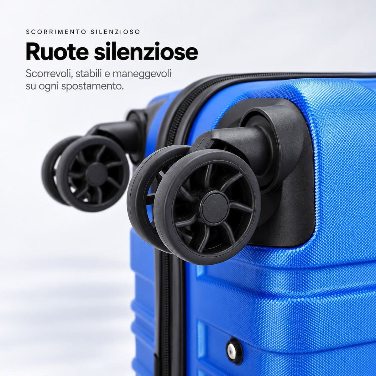 Dettaglio delle ruote doppie silenziose a 360° del trolley rigido Duo Urban blu in ABS