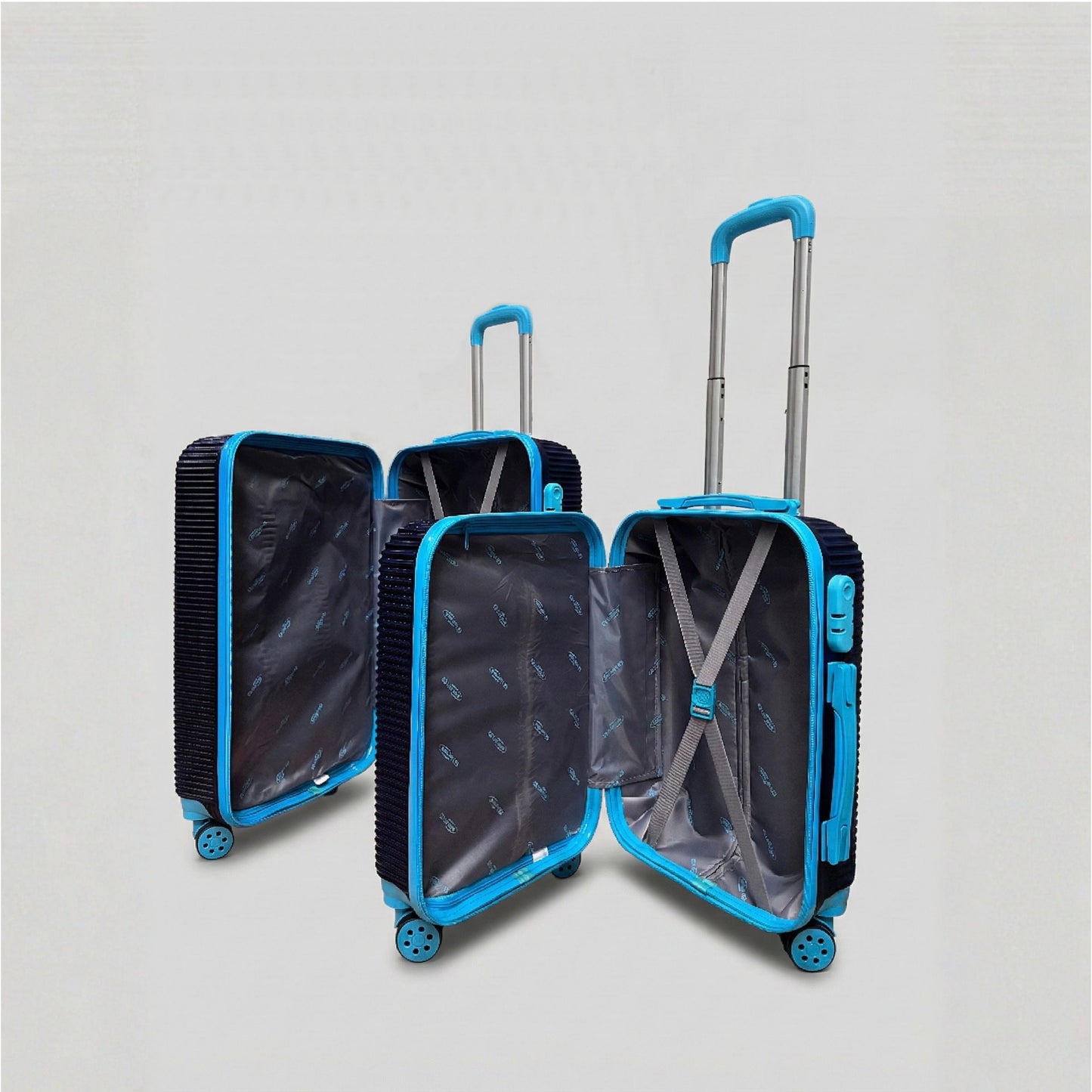 Dettaglio delle 4 ruote piroettanti e dell'interno organizzato del set valigie in ABS