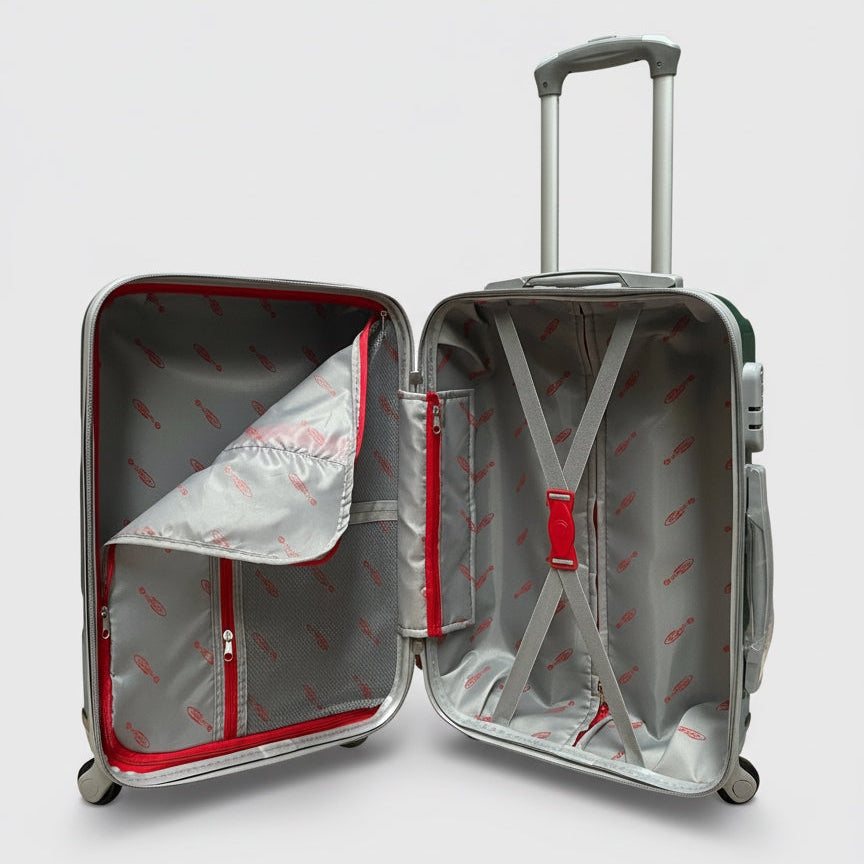 Interno organizzato del trolley con cinghie ferma-abiti elastiche e divisorio con zip per massimizzare lo spazio (40 Litri).