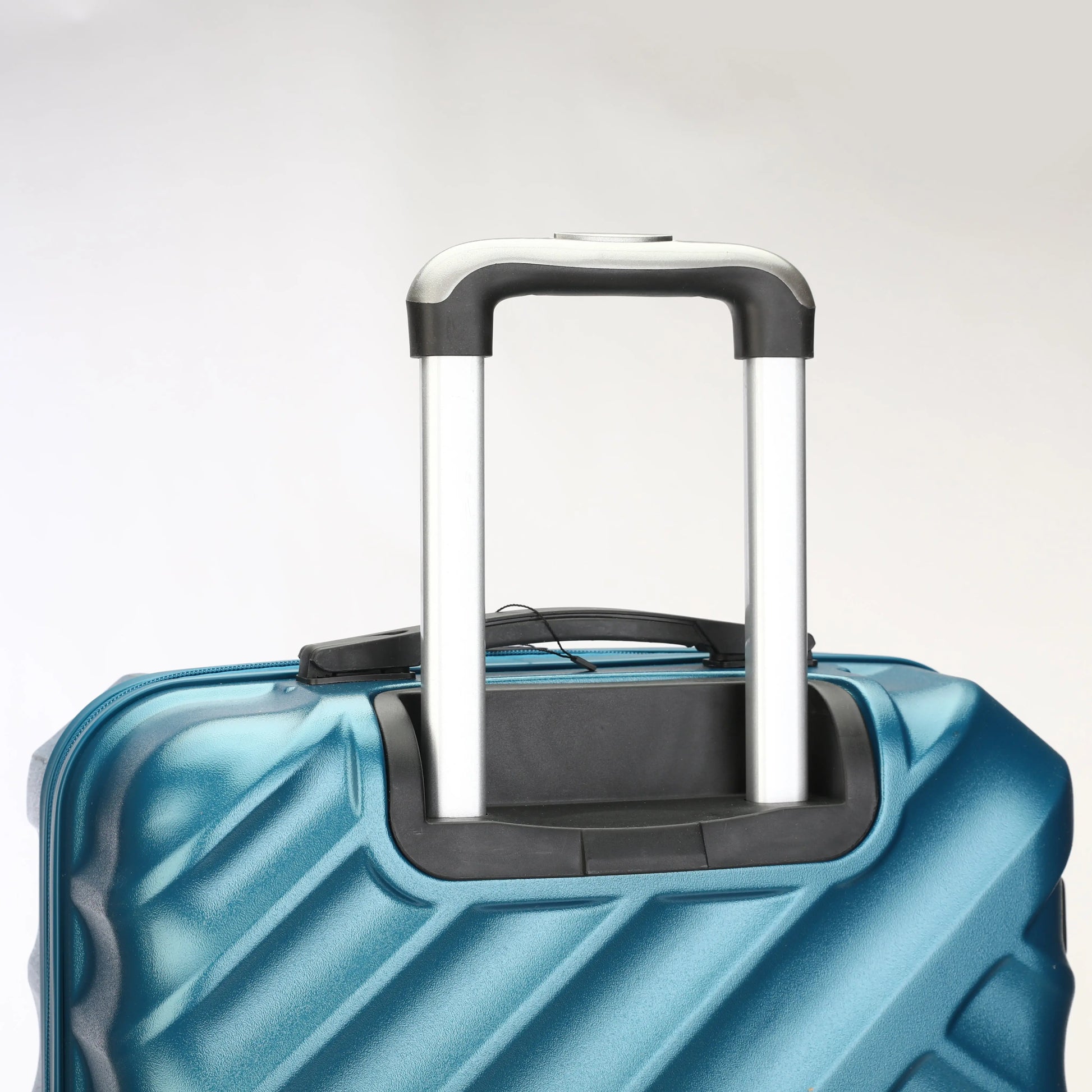 Maniglie ergonomiche superiori e laterali per trasporto comodo dei trolley Stopover