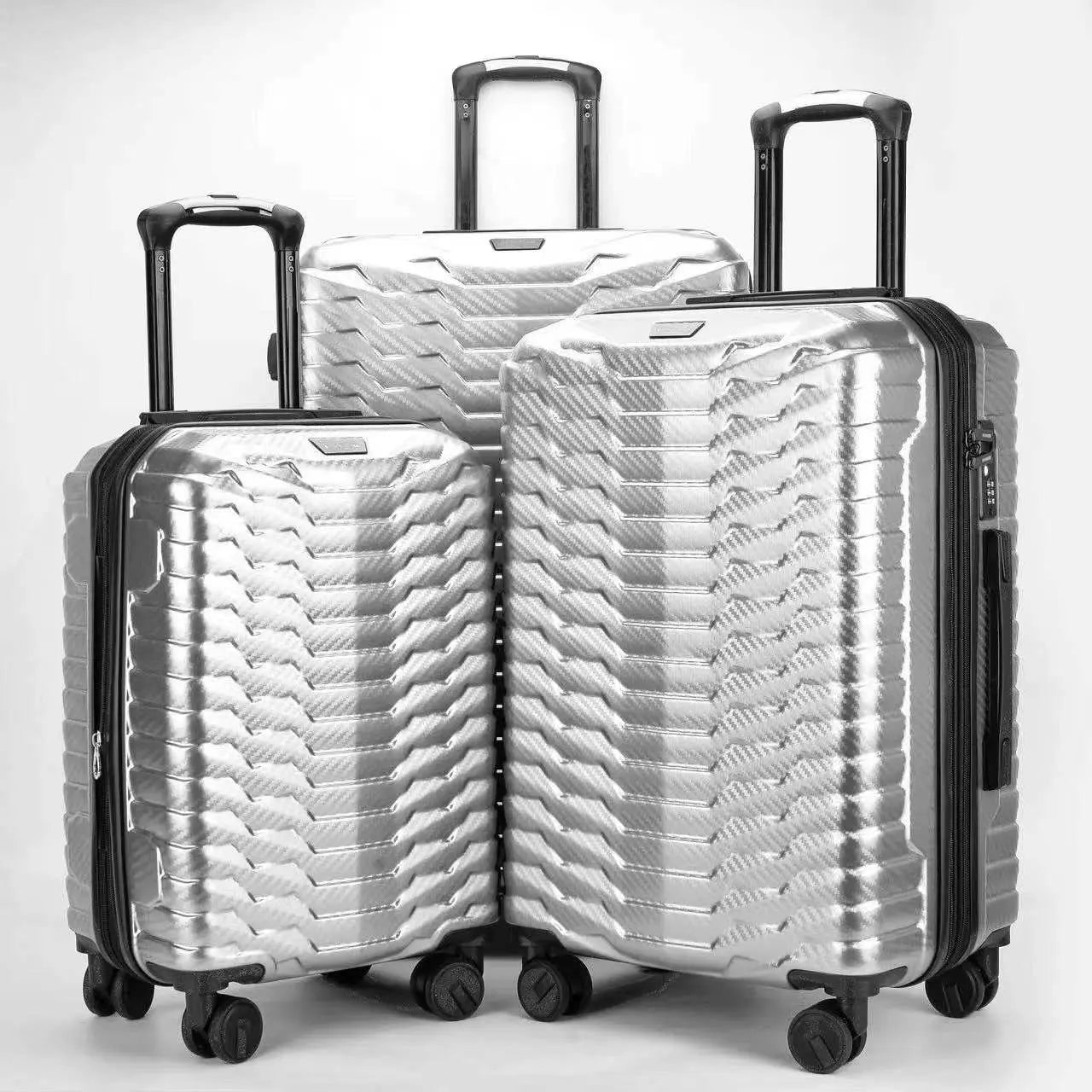 Set 3 trolley ABS+PC rigidi in vista frontale che mostra le diverse misure cabina, media e grande