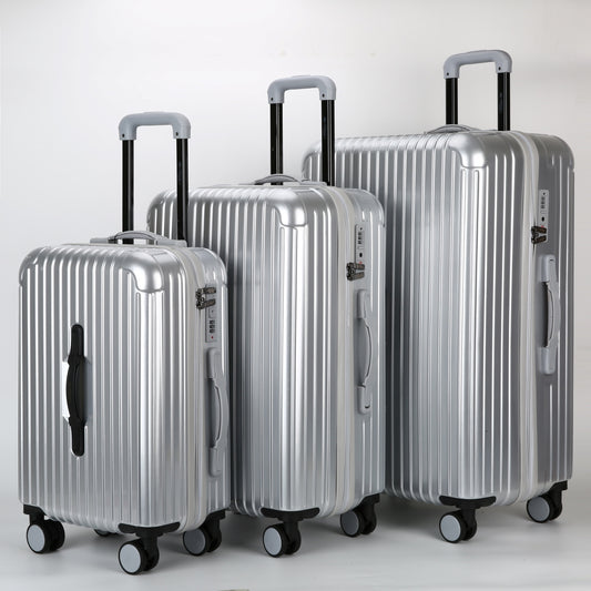 Set completo di 3 trolley rigidi STOPOVER in ABS e Policarbonato color argento, misure 55cm, 65cm e 75cm con ruote pivotanti.