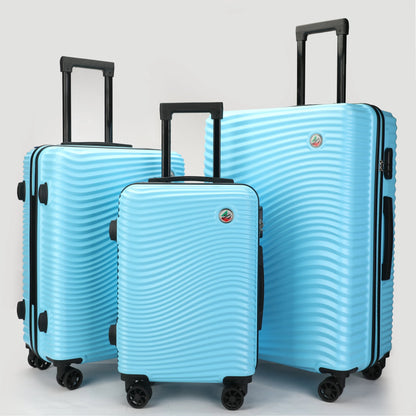 Set 3 trolley rigidi in ABS lucido visti frontalmente, eleganti e resistenti