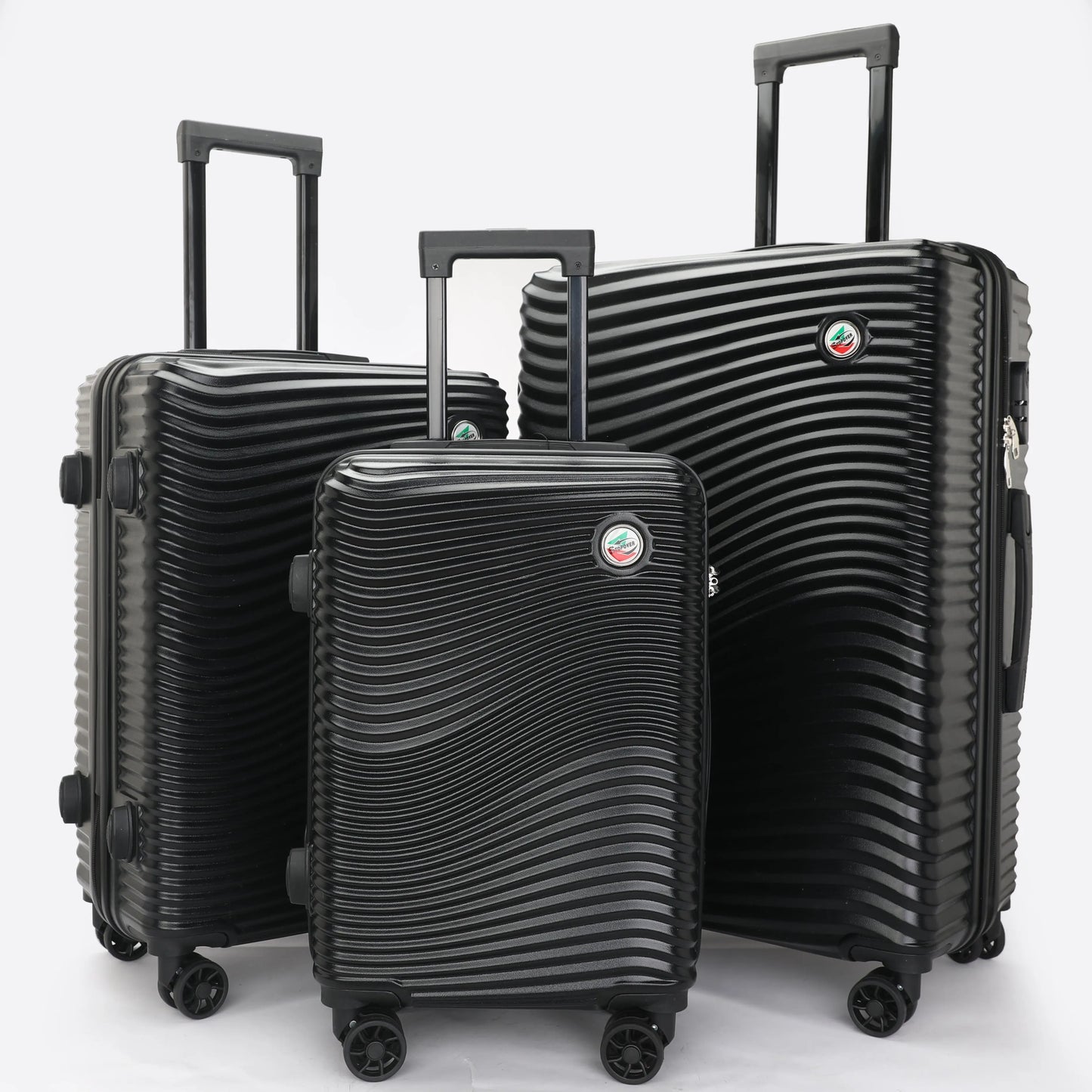 Set 3 trolley rigidi in ABS lucido visti frontalmente, eleganti e resistenti