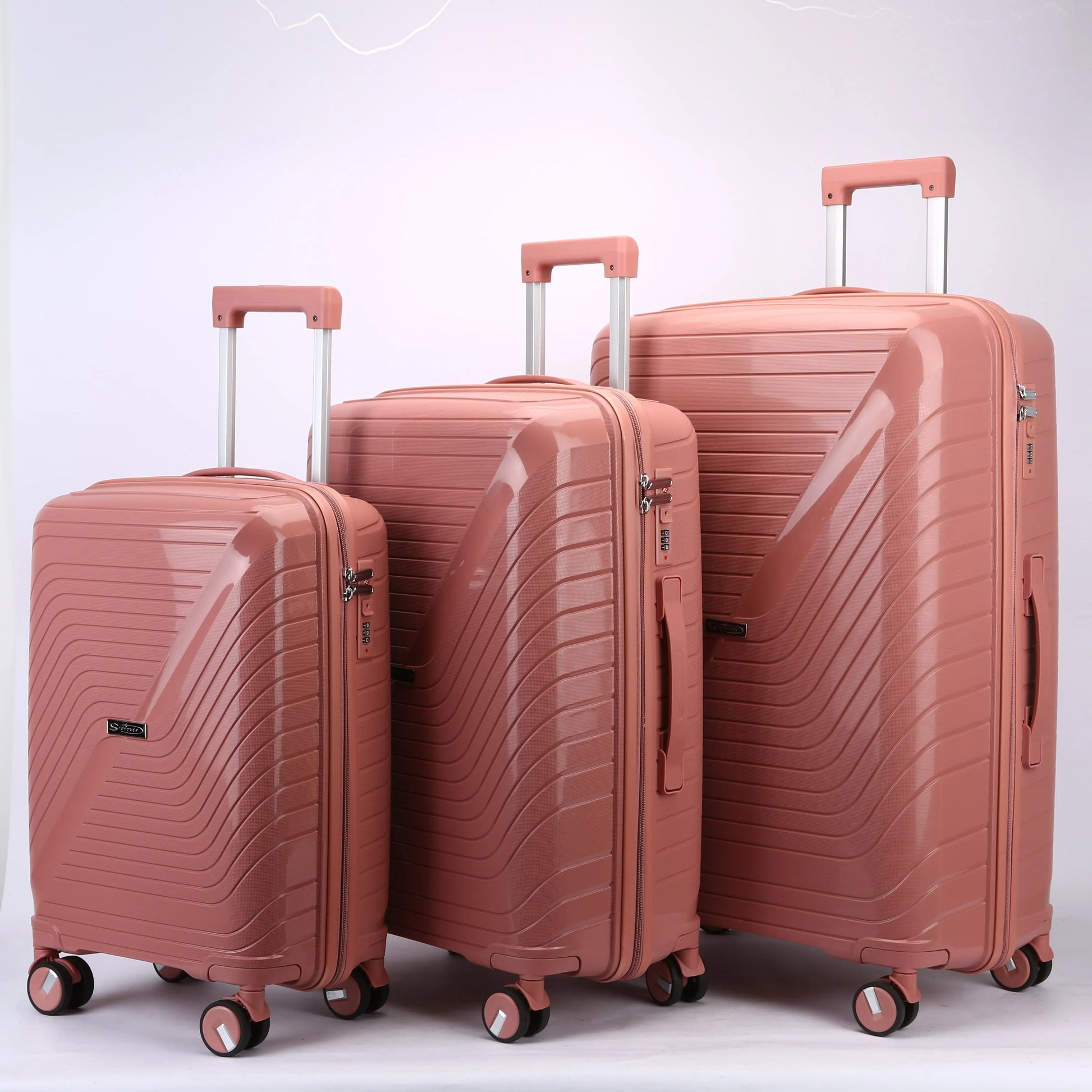 Set trolley rigidi PP vista laterale tre dimensioni cabina medio grande