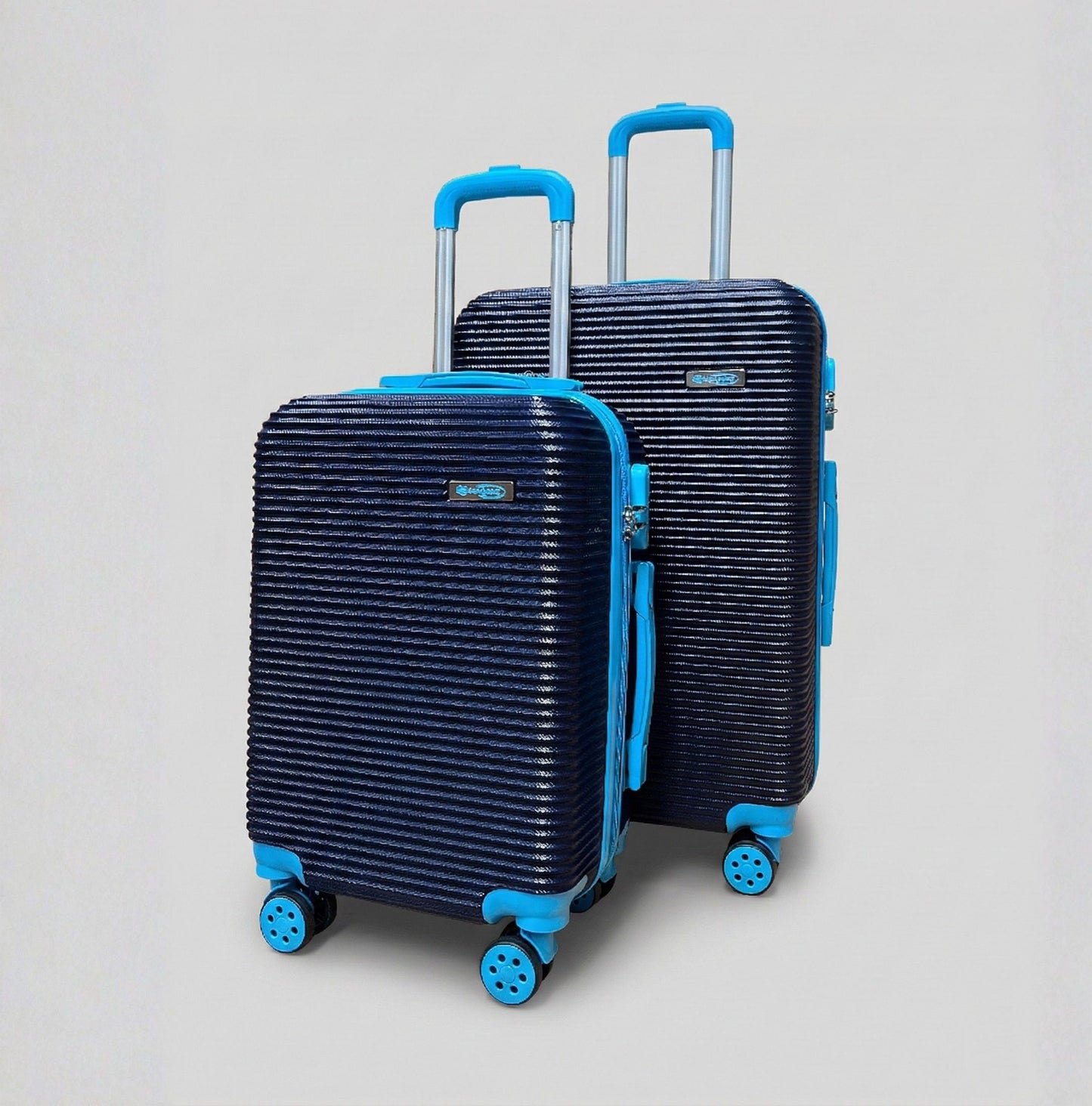 Set 2 trolley rigidi in ABS: valigia media da stiva e bagaglio a mano cabina coordinati.