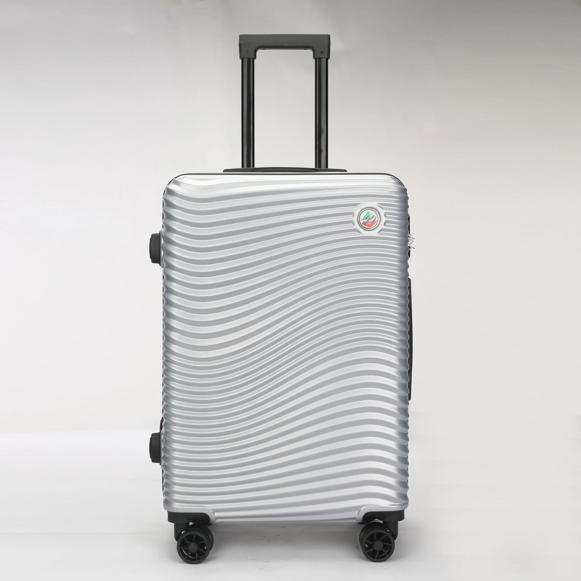 Trolley rigido ABS Stopover da 65cm colore grigio in vista frontale con ruote girevoli
