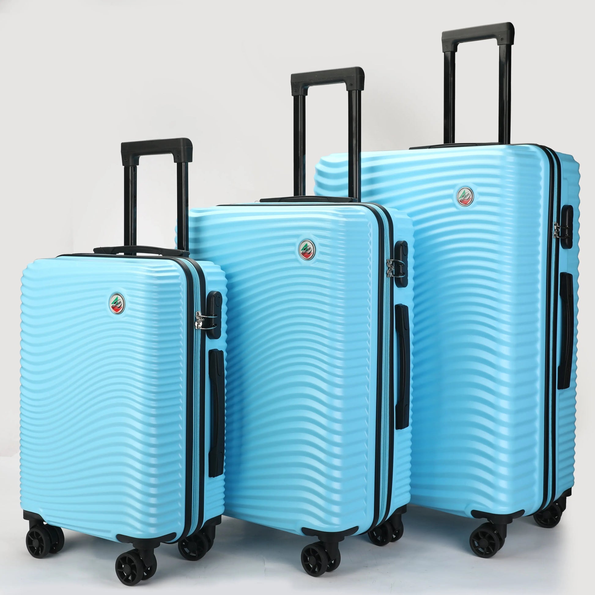 Vista frontale dei trolley ABS Stopover che mostra il design elegante nelle tre misure colore azzuro