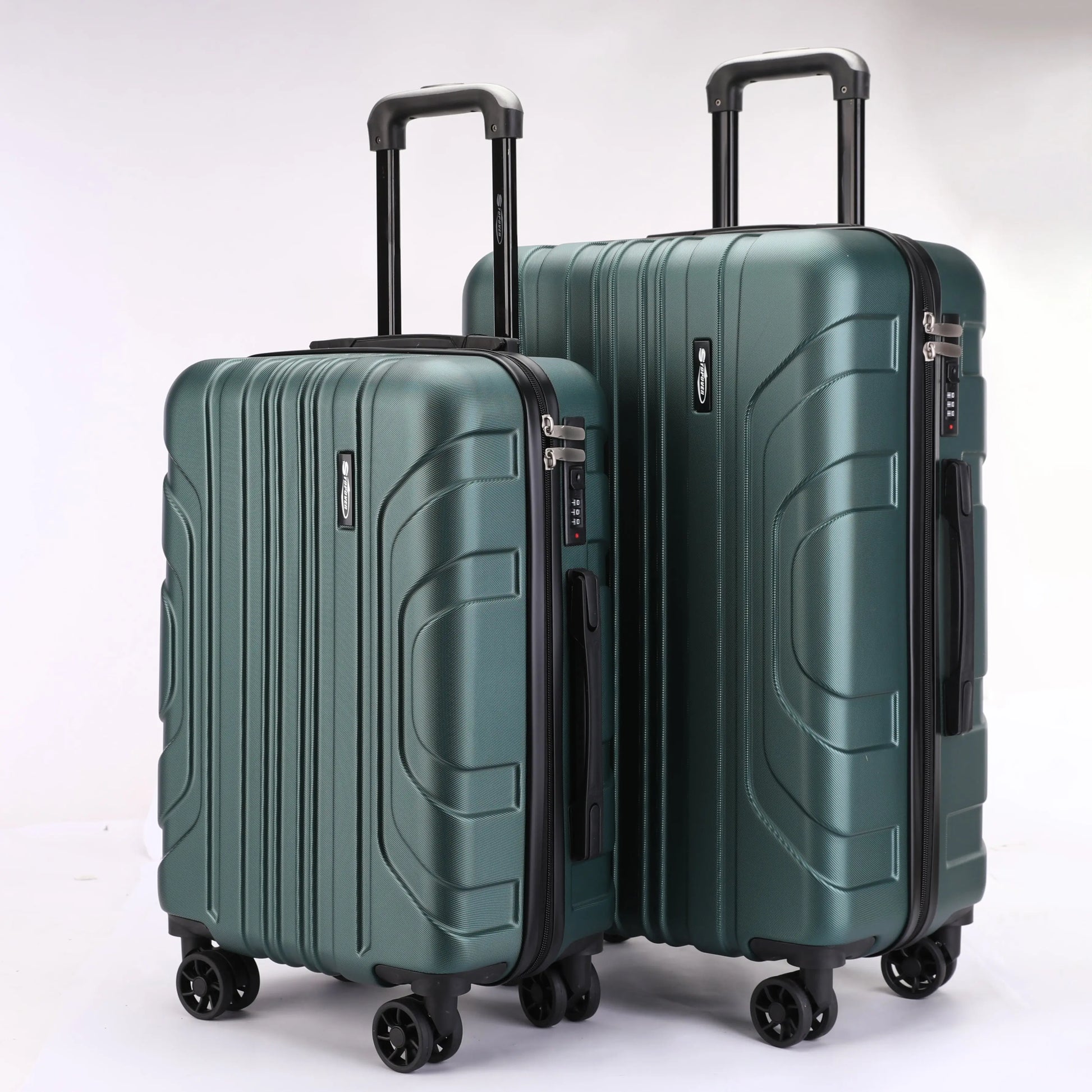 Vista frontale dei trolley rigidi ABS Stopover nelle due misure 65cm e 55cm con maniglie ergonomiche
